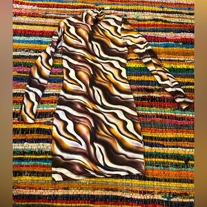 Cool 70s vibe long sleeved minidress!